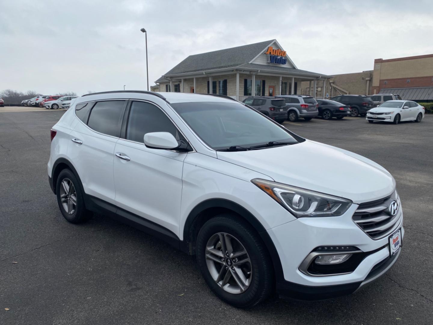 2017 WHITE Hyundai Santa Fe Sport 2.4 FWD (5XYZU3LB8HG) with an 2.4L L4 DOHC 16V engine, 6A transmission, located at 420 I-35E, Lancaster, TX, 75146, (469) 297-4144, 32.593929, -96.823685 - Photo#2